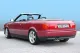 Audi 80 Cabriolet rossa vista da dietro, la targa recita "Simons". In basso a sinistra e al centro sono visibili i due terminali dell'impianto di scarico sportivo in acciaio inox 2x70 mm di Simons.